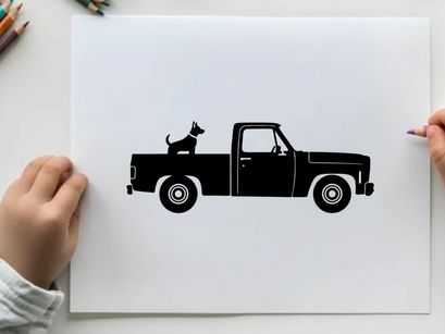Silhouette of a dog in the back of a pickup truck