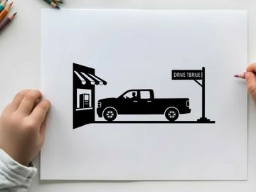 Silhouette of a pickup truck at a drive thru restaurant preview picture