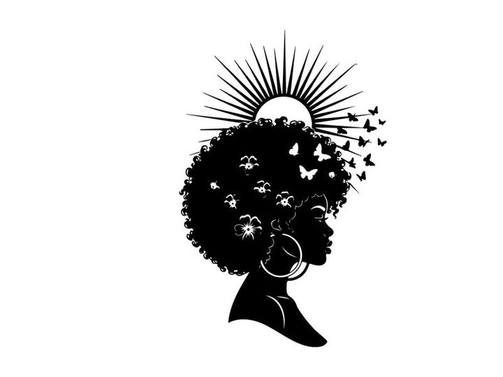 Silhouette of a woman with afro and sun rays