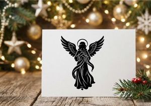 Black silhouette of a Christmas angel with wings and halo on a white background