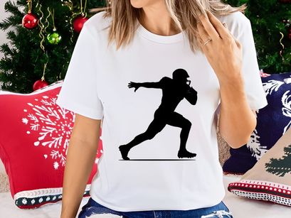 American football player running with ball in hand silhouette