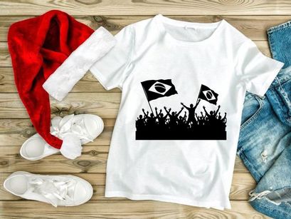 Brazilian flags waving in protest or celebration with a crowd of people