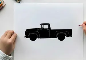 Silhouette of a classic old pickup truck against a white background
