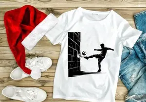 Soccer player kicking ball against brick wall in dynamic action pose