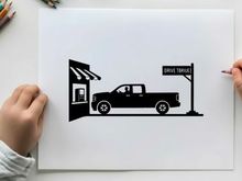 Silhouette of a pickup truck at a drive thru restaurant