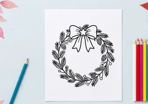 Christmas wreath line art drawing with pine cones and bow for holiday greeting card design