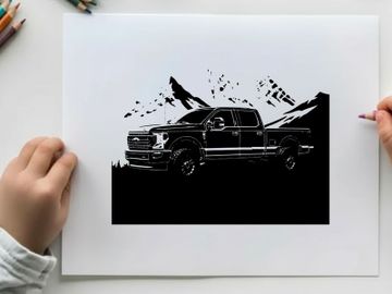 Silhouette of a pickup truck against a mountain range silhouette preview picture