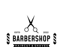 Barbershop logo in vintage style with the concept of scissors, razor and other tools.Logo for business, salon, label and barbershop.