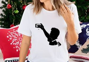 Silhouette of a boy taking a selfie with a smartphone