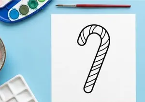 Black and white candy cane line art illustration for Christmas holiday design projects.