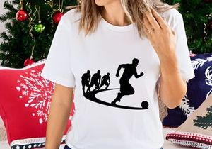 Silhouette of soccer players in action kicking ball with motion trail