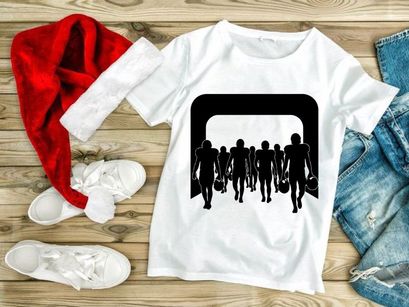 Silhouette of football players walking through an archway with bags