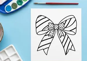 Hand-drawn striped Christmas gift bow with floral center for holiday wrapping and decor