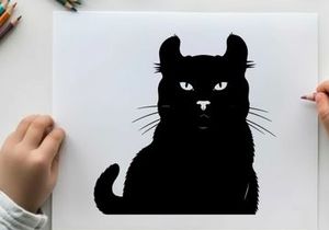 Silhouette of a black cat with piercing eyes and whiskers