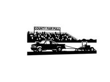 Truck towing tractor at county fair pull event silhouette