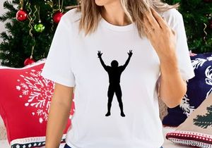 Silhouette of a person with arms raised in celebration or triumph