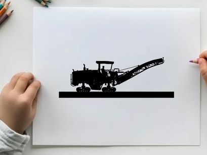 Silhouette of a large industrial machine with conveyor belt