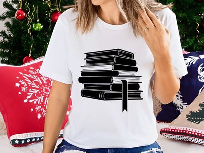 Stack of black books with quill pen education knowledge concept