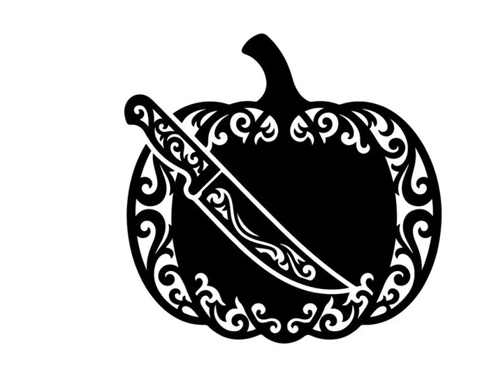 Silhouette labu dengan desain ukiran dekoratif dan pisau