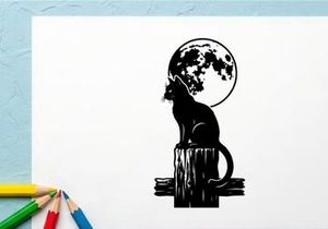 Silhouette of a cat sitting on a tree stump with full moon in background