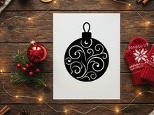 Schwarze Weihnachtskugel-Silhouette mit eleganten Wirbelmustern für Weihnachtsdesign-Projekte