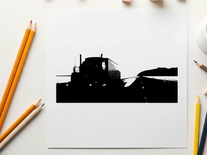 Silhouette of a semi truck driving on a highway at dawn or dusk