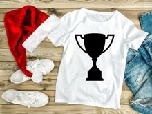 A black trophy icon with a shadow on a white background