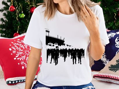 A large group of people marching in formation at an outdoor event or stadium