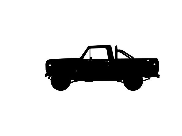 Silhouette of a classic pickup truck against a white background