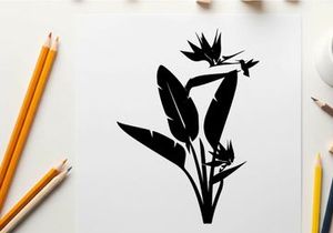 Bird of paradise flower silhouette with hummingbird