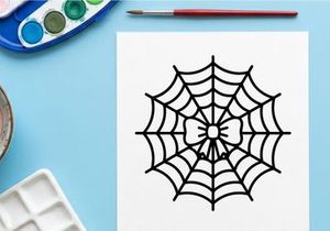 Halloween spider web with central bow design. Vector illustration of festive arachnid decoration for seasonal crafts.
