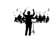Silhouette of conductor leading an orchestra in music performance