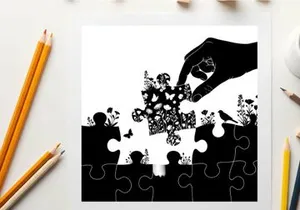 Silhouette of hand placing puzzle piece with floral pattern on white background