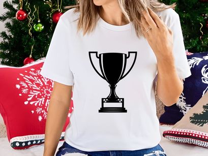 A black and white image of a trophy cup on a pedestal base