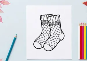 Pair of Christmas socks with polka dot and snowflake pattern line art illustration
