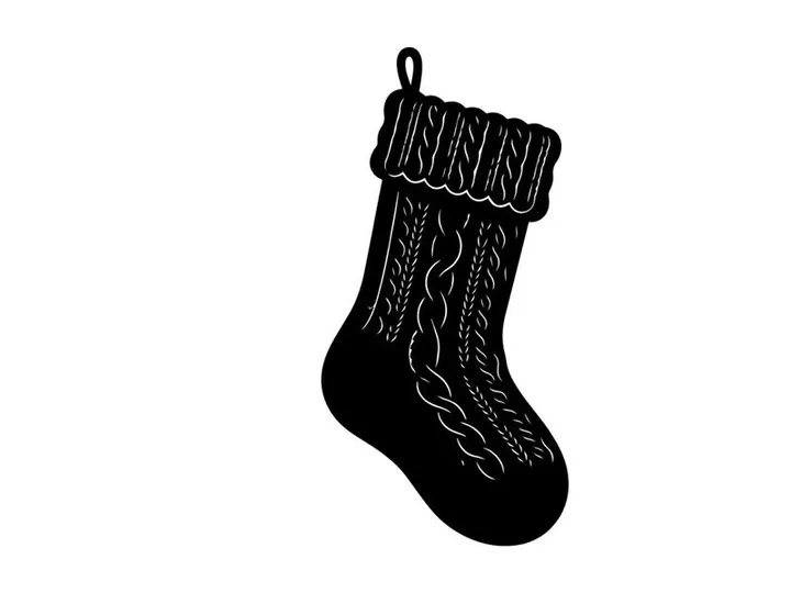 Silueta de calcetín navideño negro con textura de punto de cable aislado sobre fondo blanco