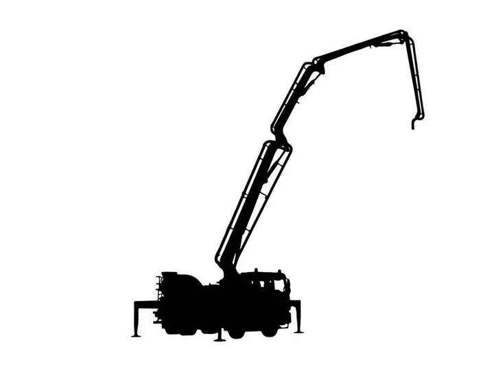 Silhouette of a mechanical excavator with a long boom and bucket