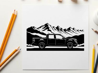 Silhouette of a pickup truck in front of a mountain range silhouette