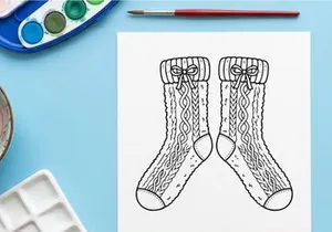 Pair of knitted Christmas socks with bows, hand drawn line art illustration.