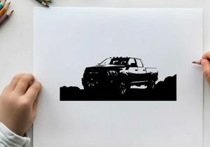 Silhouette of a pickup truck in a rugged outdoor setting silhouette