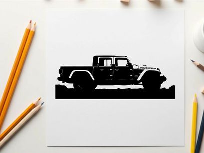Silhouette of a jeep truck against a mountainous landscape silhouette