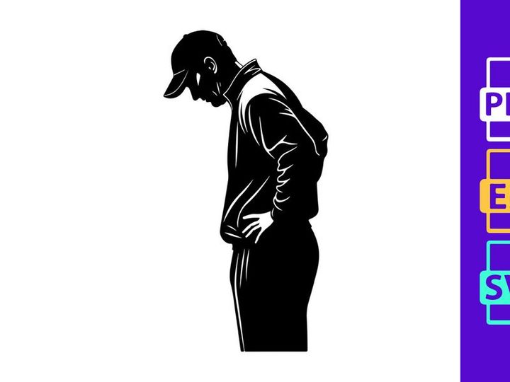 A man in a baseball cap standing with his hands on his stomach