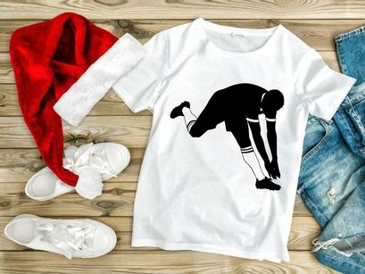 Black silhouette of a person stretching or exercising in a runner's lunge position