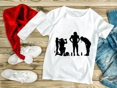 Silhouettes of football players resting and drinking from bottles on the field