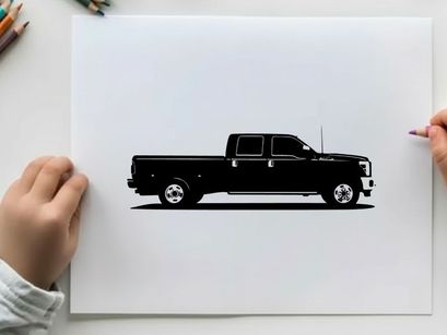 Silhouette of a large black pickup truck against a white background