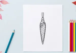 Silver and blue striped Christmas ornament with snowflake design hanging on white background