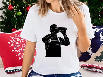 Professional photographer taking photo with DSLR camera in studio lighting