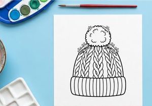 Winter knit beanie hat with pom pom line art illustration for Christmas coloring page