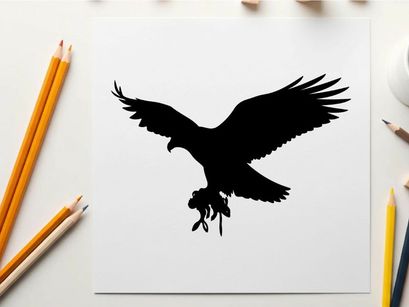 Silhouette of an eagle in flight with outstretched wings and talons extended