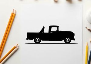 Silhouette of a dog in a vintage pickup truck